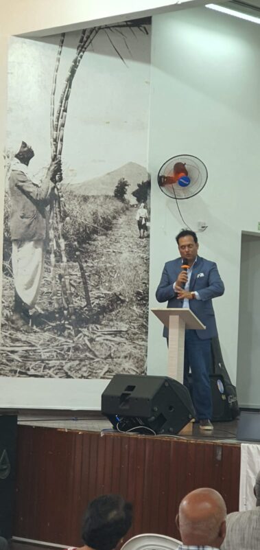 Hon. D. Damry addressing the audience